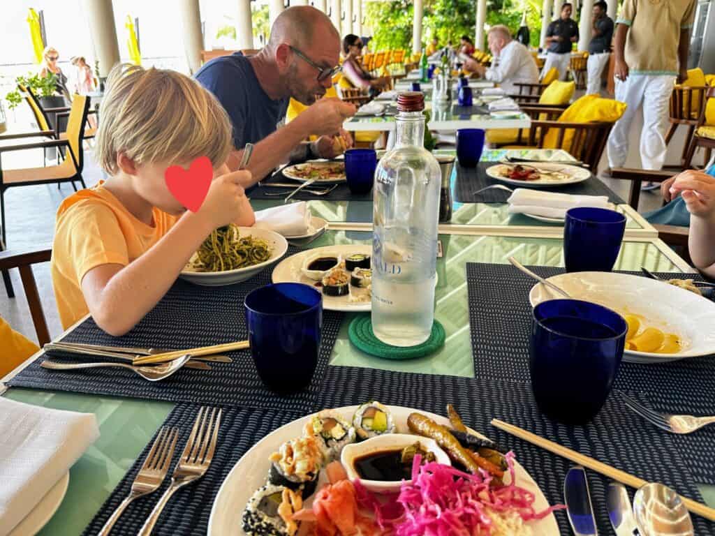 Family eats at the Aqua buffet at Emerald Faarufushi Resort in the Maldives.