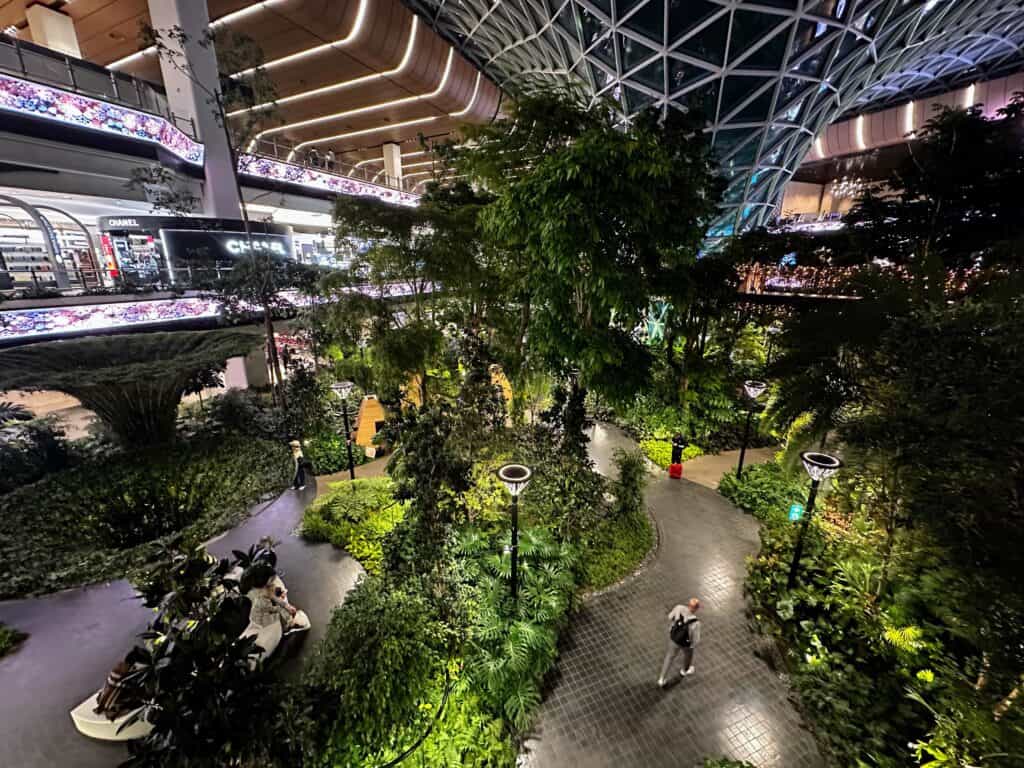 A lush garden area inside the airport in Doha, Qatar.